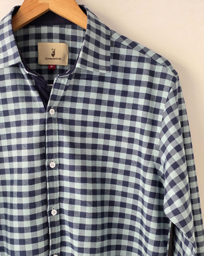 Blue flannel checkered shirt.